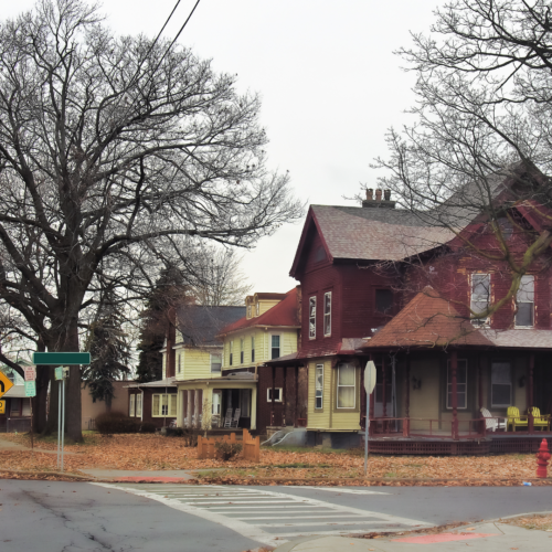 a row of old historic houses in marion illinois on a overcast autumn day